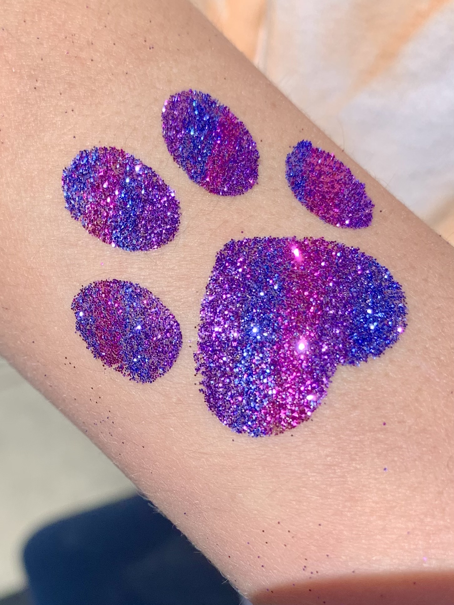 Paw print tatoo